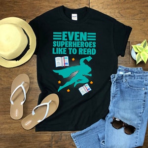 Even Superheroes Like To Read, Reading Shirt, Reading T-Shirt Gift, Gift For Book Lover, Book Nerd T-shirt by The Right Value Shop