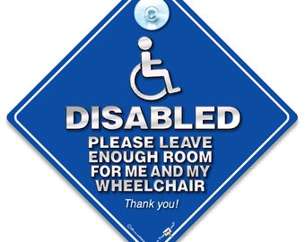 May include: Blue diamond-shaped sign with a silver wheelchair symbol and the text "DISABLED PLEASE LEAVE ENOUGH ROOM FOR ME AND MY WHEELCHAIR Thank you!"