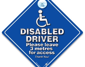 May include: Blue diamond-shaped sign with a white wheelchair symbol and the text "DISABLED DRIVER Please leave 3 metres for access Thank You!"