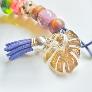Boho beaded keychain with monstera leaf charm