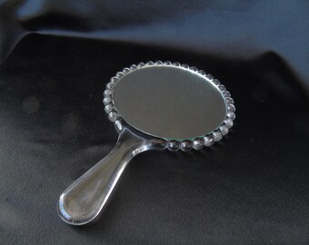 Irving R. Rice? Hand Mirror