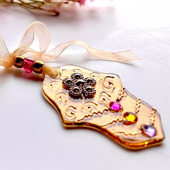 protection symbol religious gift. Rear view mirror Stained glass