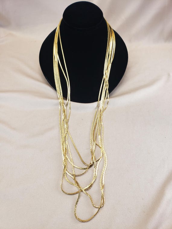 Vintage Monet Gold Plated Seven Strand Silky Necklace