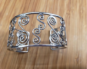 Brazalete vintage de plata de ley con volutas, México 925