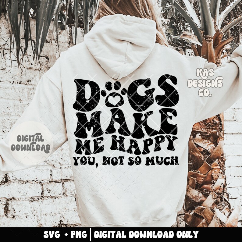 May include: White hoodie with black text that reads "Dogs make me happy you, not so much". The text is in a distressed font with a paw print and heart in the word "Dogs".