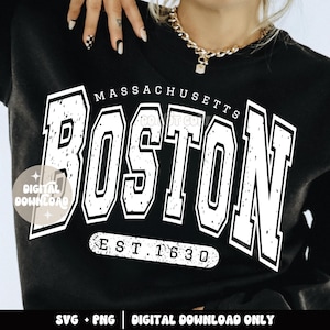 May include: Black sweatshirt with white text that reads "MASSACHUSETTS BOSTON EST. 1630".