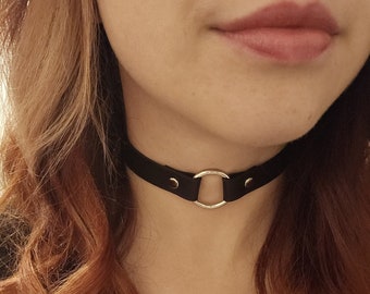 Black choker with a small ring