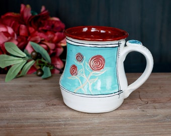 Handmade ceramic flower mug