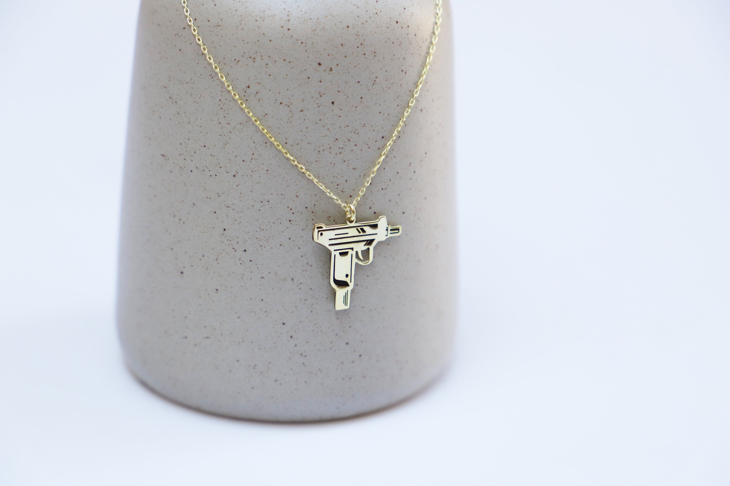 Supreme uzi shop necklace