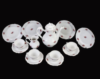 Conjunto de jantar vintage Kahla em porcelana da Turíngia para 4 pessoas, com 14 peças, decoração floral e borda dourada, incluindo xícaras, pires e pratos de bolo.