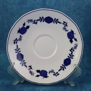 May include: A set of three ceramic mugs with a speckled, matte finish. The mugs are in shades of cream, light gray, and dark gray. Each mug has a simple, minimalist design, perfect for coffee or tea.