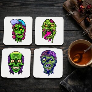 May include: A set of three ceramic mugs with a speckled, matte finish in cream, light grey, and dark grey. Each mug has a minimalist design, ideal for coffee or tea.