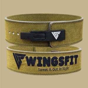 May include: Olive green weightlifting belt with black buckle and the brand name "WINGSFIT" in black. The text "Sweat It Out in Style" is below the brand name. The belt has a white border.