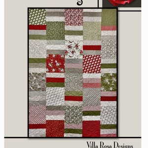 May include: A patchwork quilt with a variety of patterns in red, green, white, and gray. The quilt features squares of floral, geometric, and striped designs. The words "First Night" are at the top, and "Villa Rosa Designs" is at the bottom.