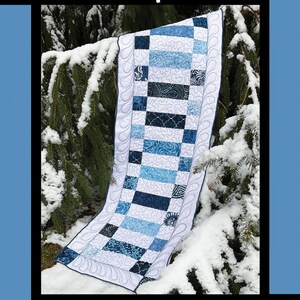 May include: A blue and white quilt pattern with the title "Snowfall" and the text "Tricia Lynn Maloney Orphan Quilt Designs for Villa Rosa Designs".