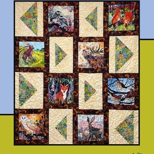May include: A quilted wall hanging with the word "Seasoning" at the top. The quilt features squares with animal illustrations, including owls, foxes, and rabbits, interspersed with floral and geometric patterns. The designer's name, Heidi Cook, is at the bottom.