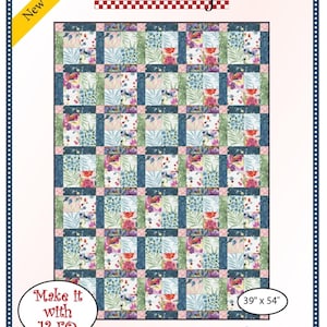 May include: A Fabric Cafe quilt pattern featuring a patchwork design with floral and leaf patterns in shades of blue, green, pink, and white. The quilt measures 39 inches by 54 inches. The text on the pattern reads "Fat Quarter 4 Patch."