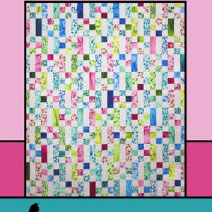 May include: A quilt pattern called "Confetti" by Melissa Milligan for Villa Rosa Designs. The quilt features a patchwork design with squares of various colors and patterns, including pink, blue, green, and white.