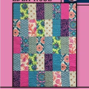 May include: A quilt pattern called "Eden Rose" by Villa Rosa Designs. The quilt is made up of colorful squares with floral and geometric patterns in shades of pink, blue, green, and white.