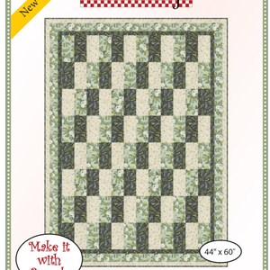 May include: A quilt pattern titled "Fun Times" by Fabric Cafe. The quilt features a checkerboard design with alternating blocks of floral and solid patterns in shades of green, cream, and black. The finished quilt size is 44 x 60 inches.