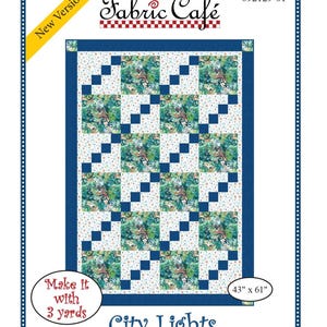 May include: A quilting pattern for a quilt called "City Lights" by Fabric Cafe. The pattern is for a quilt that is 43 inches by 61 inches and requires 3 yards of fabric. The quilt is made up of blue and white squares with a floral print.