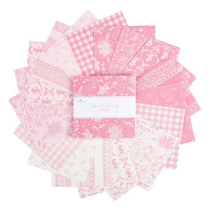 May include: A trio of cream-glazed ceramic mugs, each adorned with a hand-painted floral pattern in blue, green, and yellow. The mugs have a speckled finish and a classic, rounded design with a handle. Ideal for tea or coffee.