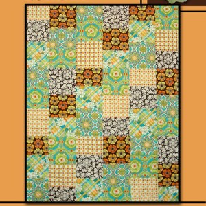 May include: A patchwork quilt with a variety of floral and geometric patterns in shades of orange, green, brown, and white. The word "EUREKA" is at the top, and "Villa Rosa Designs" is at the bottom.