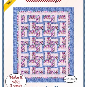 May include: A quilting pattern for a Windmill quilt, featuring a blue and white floral fabric. The pattern is 44 1/2 inches by 55 1/2 inches and requires 3 yards of fabric.