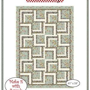 May include: A quilting pattern for a quilt called "Carousel" by Fabric Cafe. The pattern is for a quilt that is 41 inches by 59 inches and requires 3 yards of fabric. The quilt design features a geometric pattern of squares and rectangles in a light blue and white color scheme.