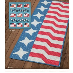 May include: A quilting pattern for a lap quilt featuring a red, white, and blue star-spangled design. The pattern is called "Star Spangled" and is from Atkinson Designs.