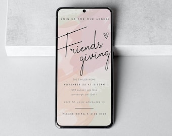 May include: A digital invitation on a smartphone screen for a Friendsgiving event. The invitation features a watercolor background with a pink and orange color scheme. The text reads "Join us for our annual Friendsgiving, The Taylor Home, November 25 at 3:30pm, 598 Pumpkin Pie Lane, Pittsburgh, PA 13671, RSVP to us by November 15, Please bring a side dish."