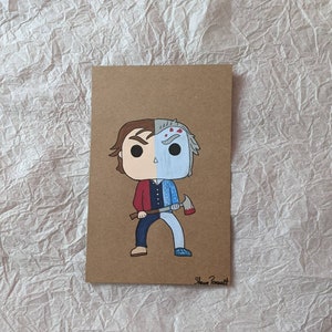May include: Hand-painted artwork on a brown card featuring a split character design. One side depicts a figure in red and blue, holding an axe. The other side shows a figure with a hockey mask and blood splatter.