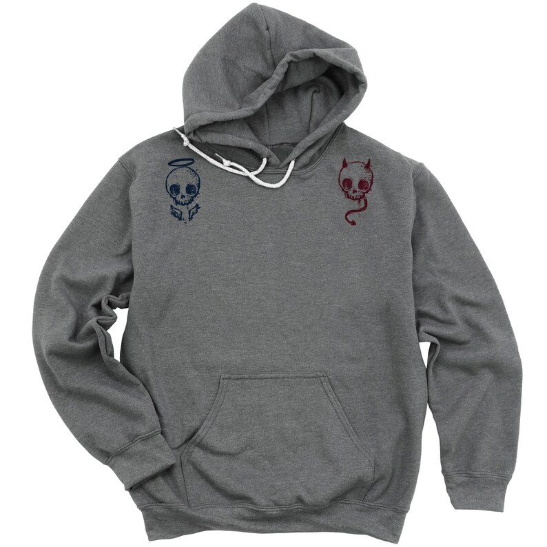 May include: A heather grey hooded sweatshirt with a skull with angel wings on the left side and a skull with horns on the right side.