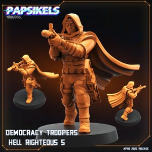 May include: A set of three miniature figures of soldiers wearing hooded cloaks and holding weapons. The figures are painted in a brown and orange colour scheme. The figures are labelled "Democracy Troopers Hell Righteous 5".