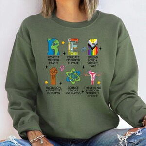 Resist Sweatshirt - Respect Mother Earth, Empower Education, Spread Love, Inclusion, Diversity, Pro-Choice, Science Drives Progress Bild 2