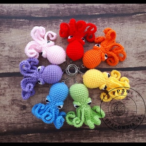 Amigurumi Judgmental octopuses with 3 hats, ax, broom and sunglasses key chain pattern pdf ENG PL image 1