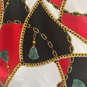 New!! Chains and tassels design on nylon spandex fabric sold by the yard