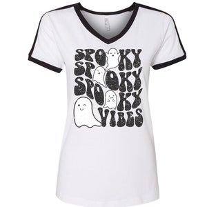 May include: White t-shirt with black ringer detail and a black and white graphic print of ghosts and the text "Spooky Vibes".