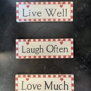 Hanging Shabby Chic Set of 3 Wooden Signs with Cute Slogans - Live Well, Laugh Often, Love Much - 28cm x 9.5cm with Wire Loop Gift Wall Art