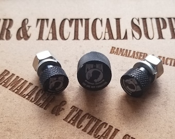 May include: Three black metal valve stem caps with a POW-MIA logo and the text "You Are Not Forgotten".