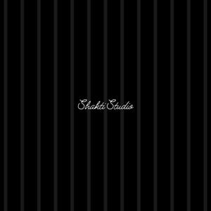 May include: Black background with vertical gray stripes. The words "Shakti Studio" are written in a cursive font in the center of the image.