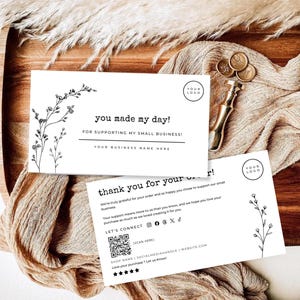 May include: Two rectangular white thank you cards with black text and botanical line art. The top card reads you made my day! FOR SUPPORTING MY SMALL BUSINESS! The bottom card reads thank you for your order! with social media icons and a QR code.