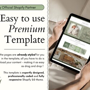 May include: A screenshot of a website template for a baby clothing store. The template features a green and white color scheme with a leafy design. The text "BABYWEAR" is displayed in a large font on the website.