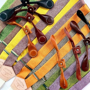 Handmade linen suspenders with button-on and leather magnetic clasp attachments in Cognac, Chocolate, and Black. Ethically made with yarn-dyed linen and full-grain veg-tan leather. Perfect for weddings, groomsmen, vintage menswear, and formal wear.