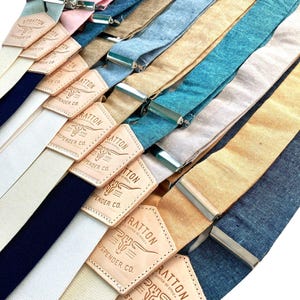 Pastel and neutral linen suspenders with leather back patches and silver hardware. Perfect for weddings, groomsmen, and classic menswear. Handmade in Texas by Stratton Suspender Co.
