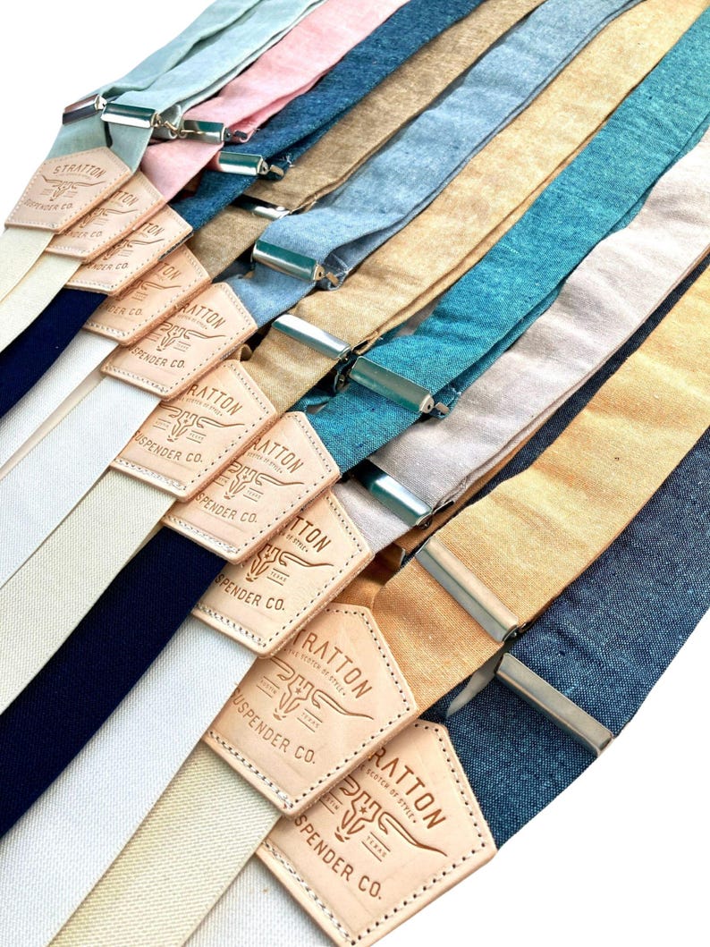 Pastel and neutral linen suspenders with leather back patches and silver hardware. Perfect for weddings, groomsmen, and classic menswear. Handmade in Texas by Stratton Suspender Co.