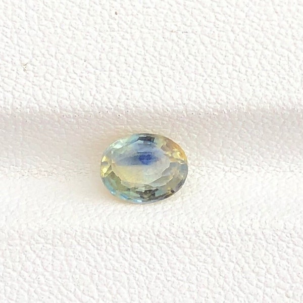 1.45cts Yellow-Blue Bicolor Sapphire Unheated Oval 7.0x5.6x3.5mm