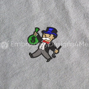 May include: Embroidered patch of Mr. Monopoly, a cartoon character wearing a top hat and tuxedo, holding a bag of money with a dollar sign.