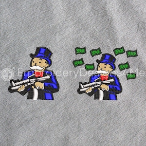May include: A digital embroidery design featuring a cartoon Monopoly Man holding a gun and money flying around him. The design is in blue, red, green, and black.