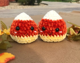 A Pair of Candy Corn Halloween Plushies